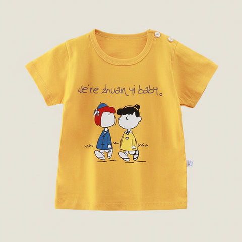 Yellow t-shirt with cartoon characters and text on a hanger against a white background