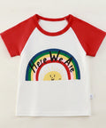 Children's t-shirt with red sleeves and rainbow design on a hanger against a white background