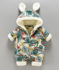 Baby snowsuit with floral pattern and bunny ears on a gray background