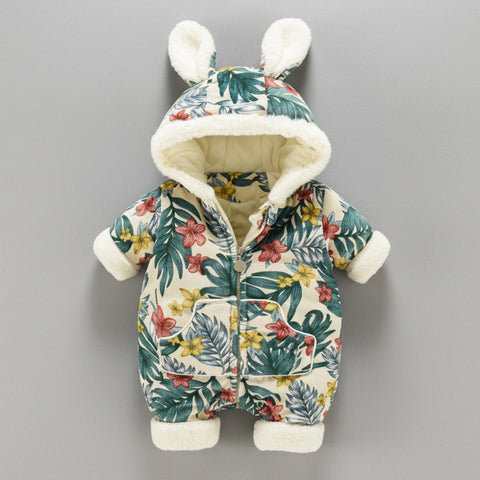 Baby snowsuit with floral pattern and bunny ears on a gray background