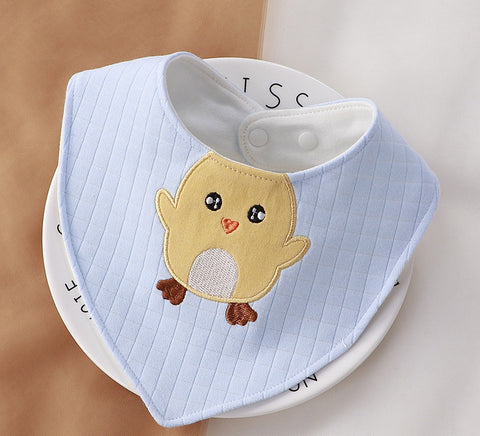 Baby bib with chick design on a white background