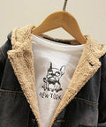Children's jacket with beige fleece lining on a hanger against a neutral background