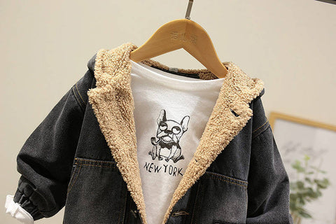 Children's jacket with beige fleece lining on a hanger against a neutral background