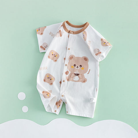 Baby romper with bear pattern on a light green background