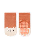 Pair of baby socks with bear face design on a white background
