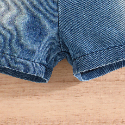 Komplet iz mehke, zračne majice in kratkih hlač z vzorcem dinozavrov